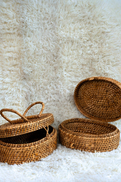 Oval Lidded Cane Storage Basket